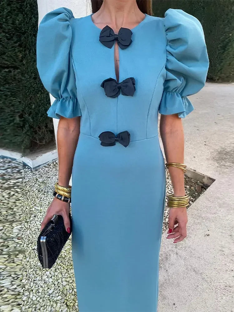 Elegantes Isabella® Kleid mit Schleife und Puffärmeln