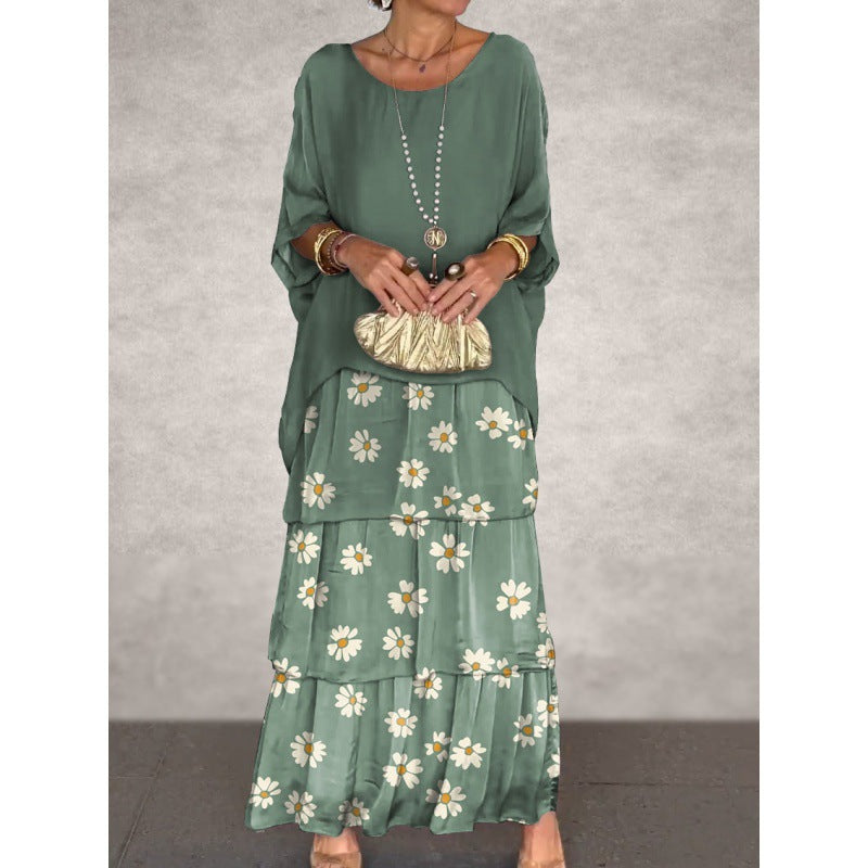 Elegantes langes Damenkleid mit Rundhalsausschnitt und Fledermausärmeln von Krohn-e