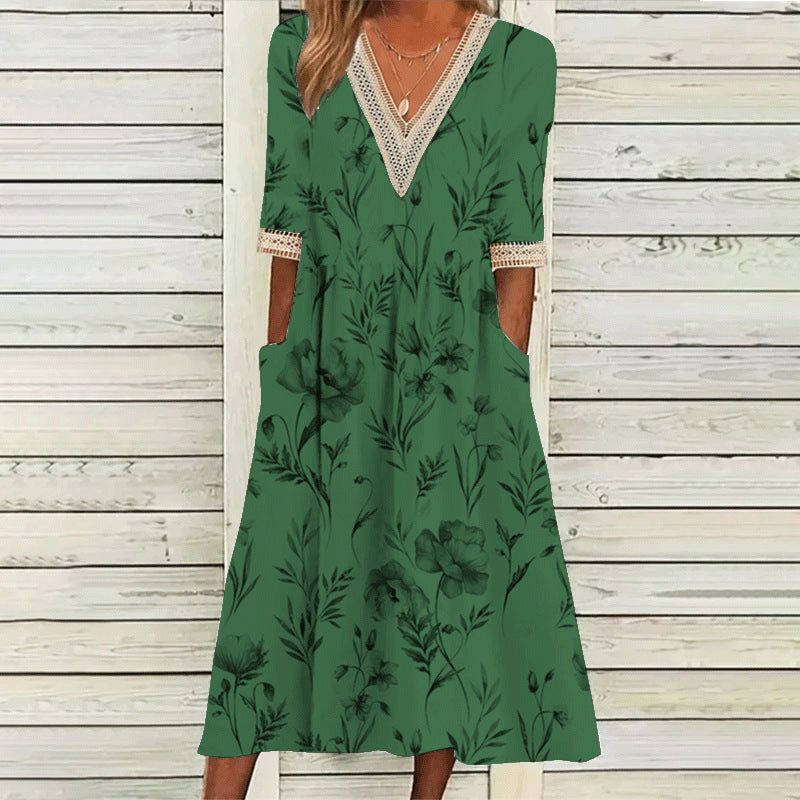 Elegantes Spitzenkleid mit V-Ausschnitt und Dreiviertelärmeln von Fudus