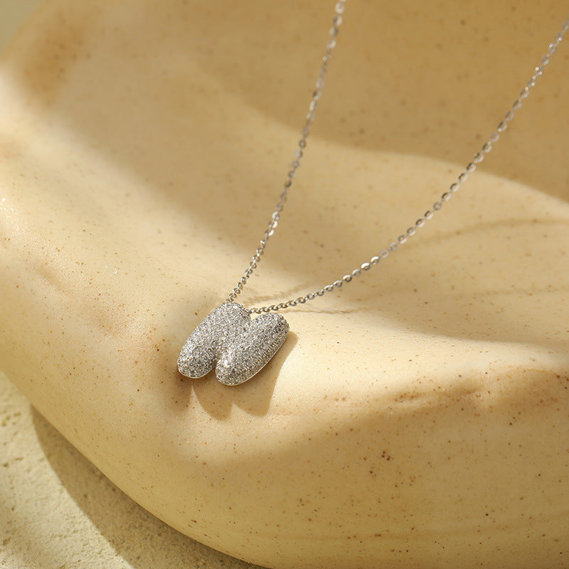 Fudus Stahl-Anhänger mit dicken Buchstaben