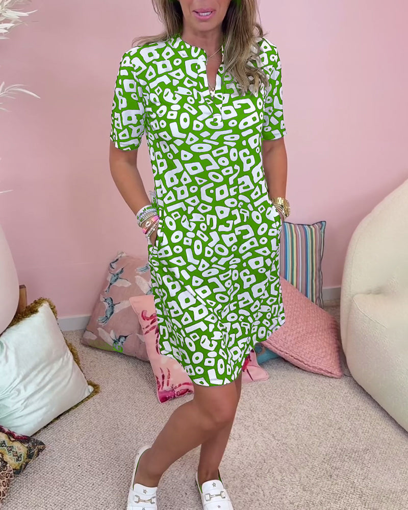 Porsha Kleid mit V-Ausschnitt, Taschen und Print
