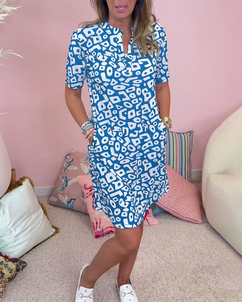 Porsha Kleid mit V-Ausschnitt, Taschen und Print