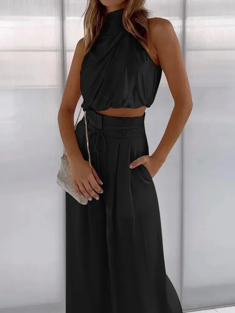 Damen-Modekostüm mit Bluse und weiten Hosen