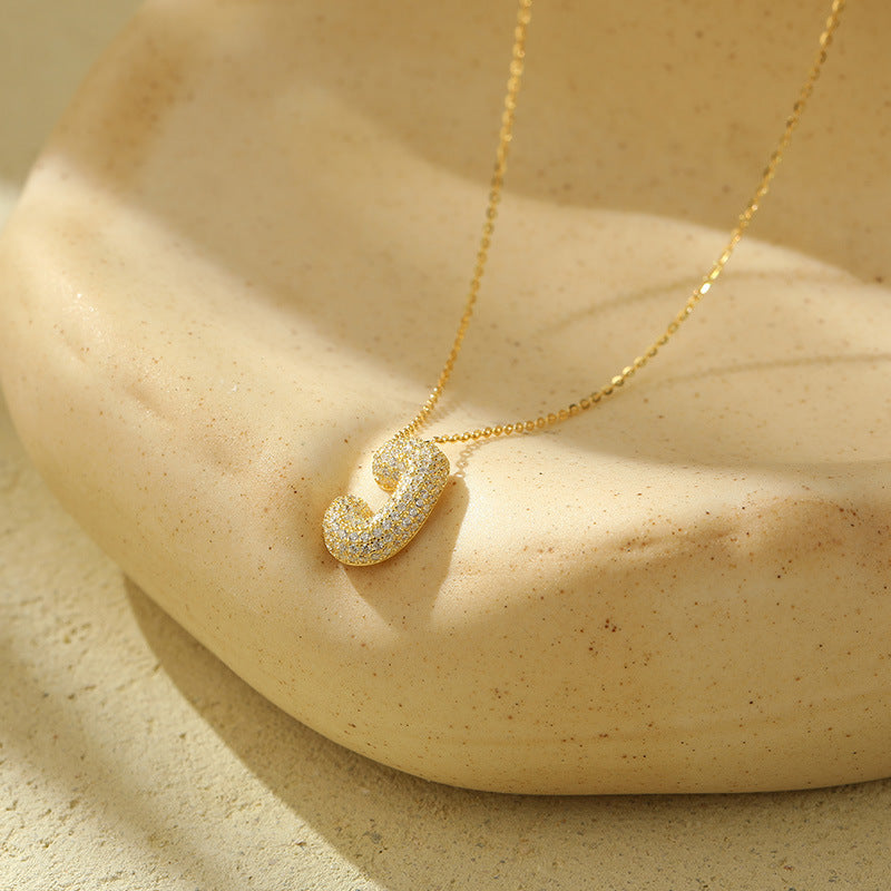 Fudus Stahl-Anhänger mit dicken Buchstaben