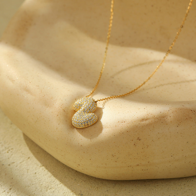 Fudus Stahl-Anhänger mit dicken Buchstaben