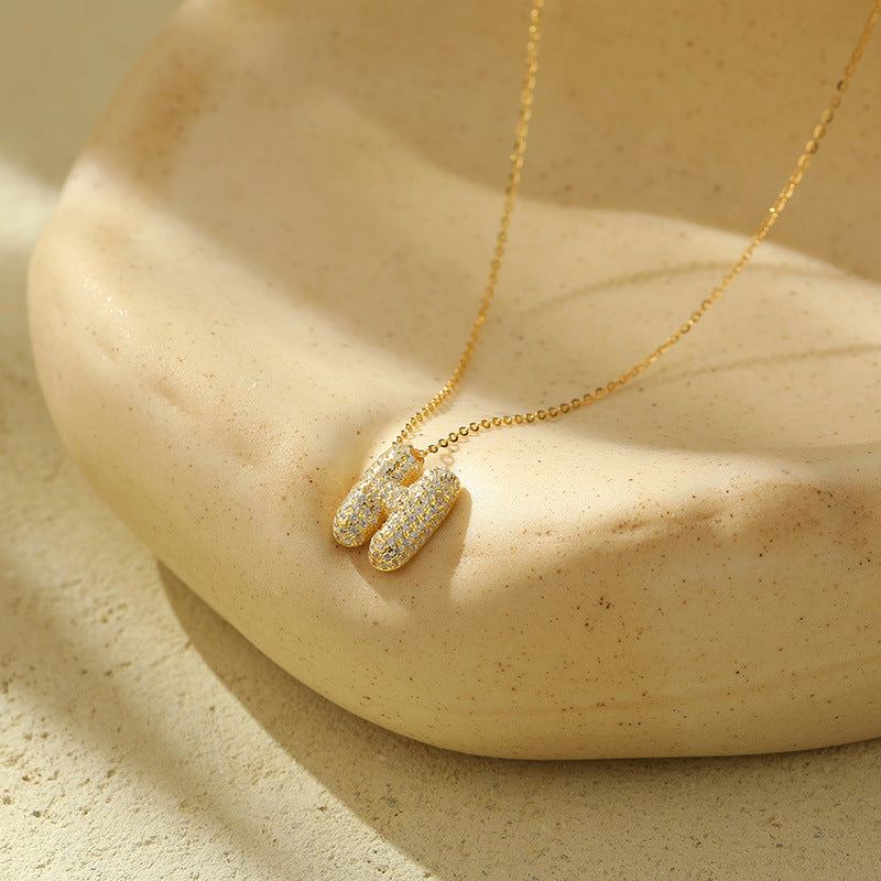 Fudus Stahl-Anhänger mit dicken Buchstaben