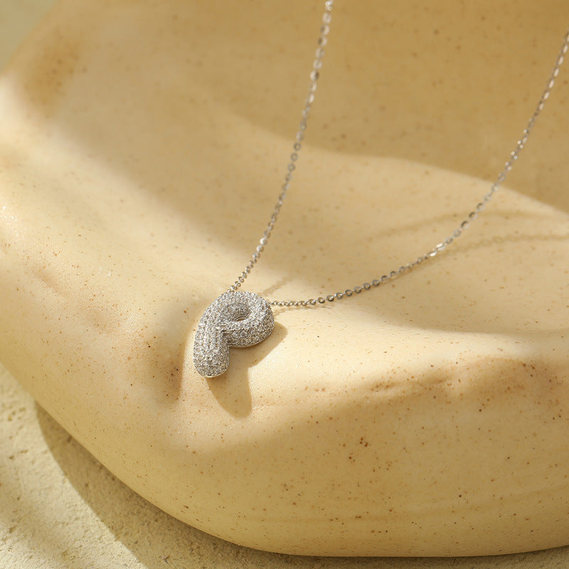 Fudus Stahl-Anhänger mit dicken Buchstaben