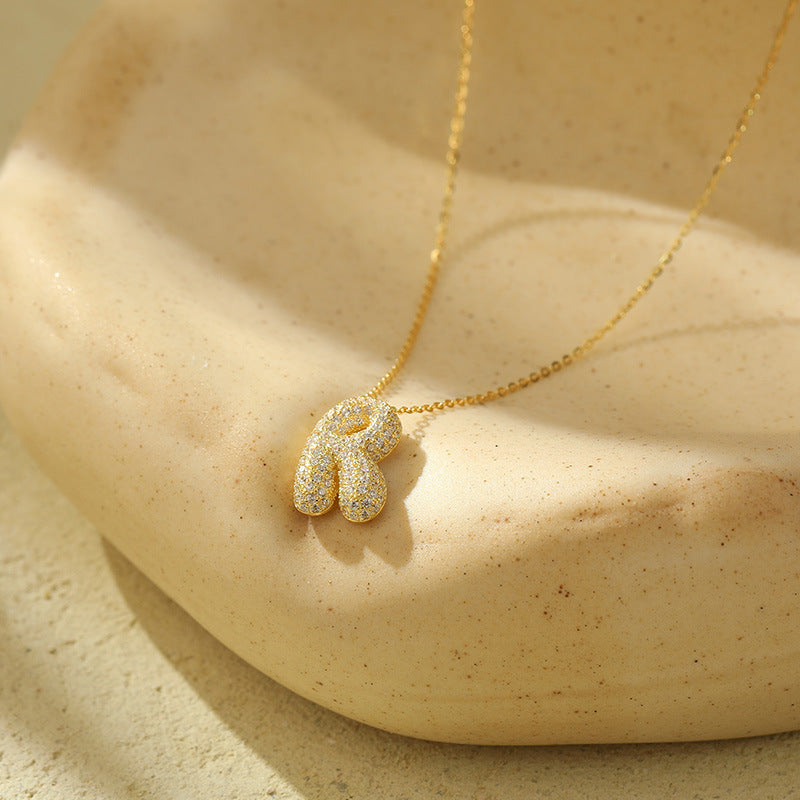 Fudus Stahl-Anhänger mit dicken Buchstaben