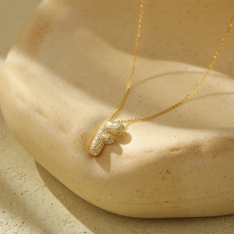 Fudus Stahl-Anhänger mit dicken Buchstaben