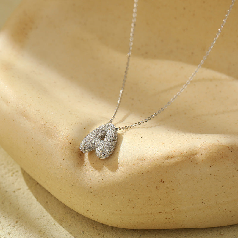 Fudus Stahl-Anhänger mit dicken Buchstaben