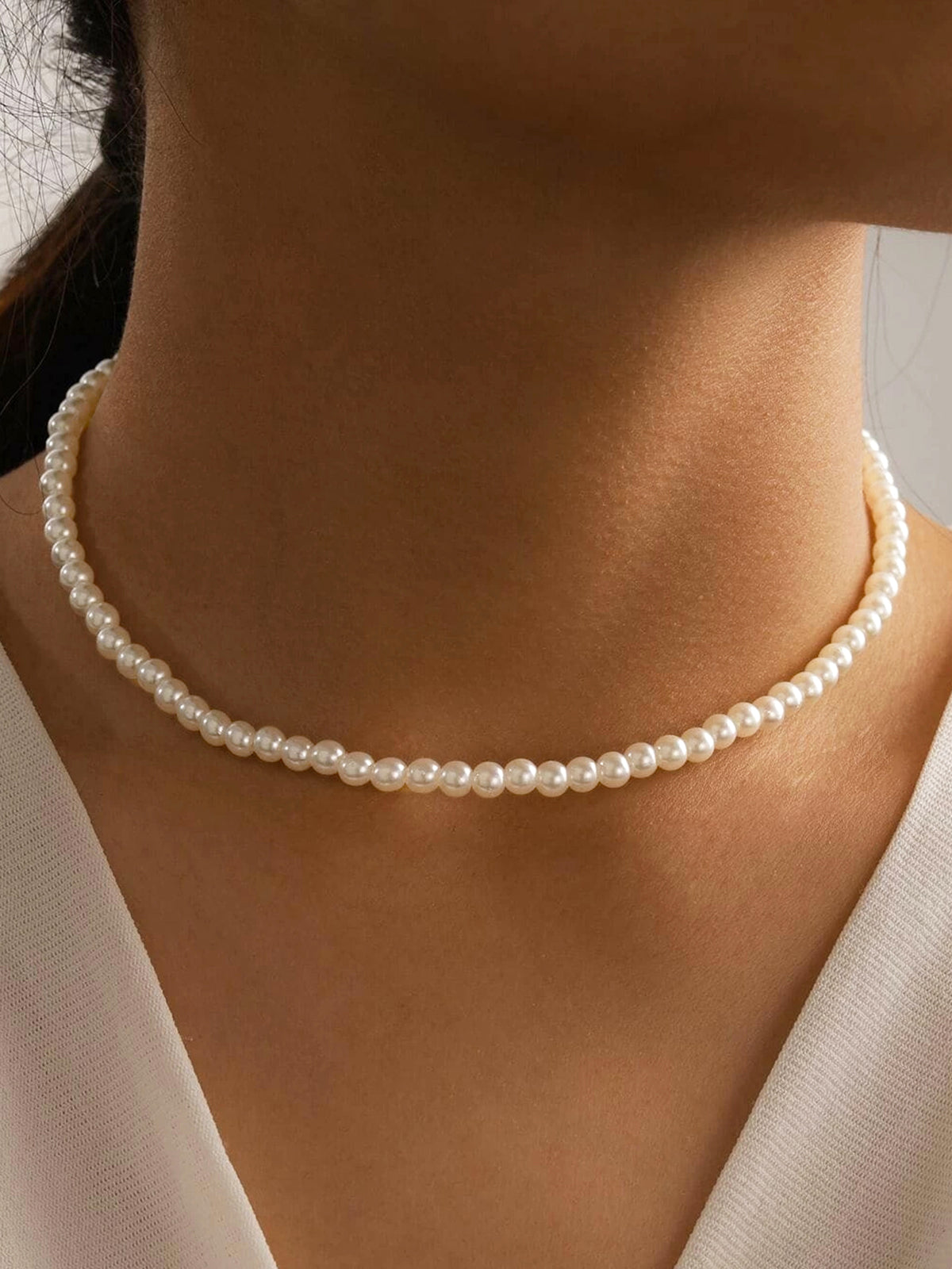 Damenkette im Old-Money-Stil mit Perlen
 - Krohn-e