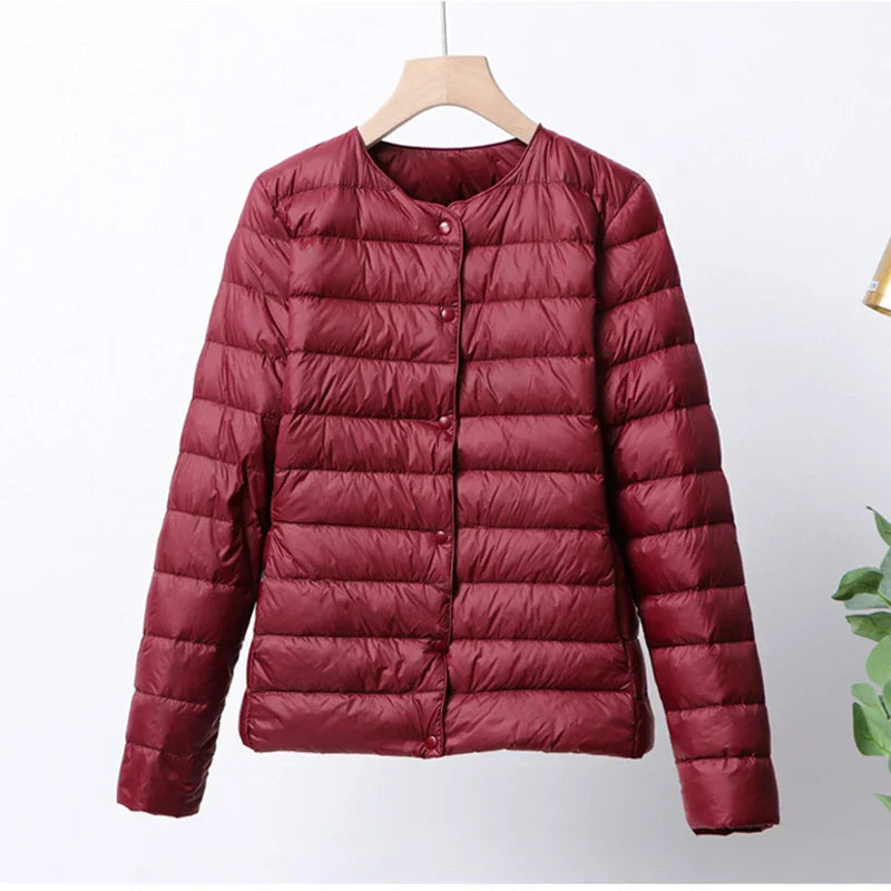 Krohn-e | Faltbare Pufferjacke mit Druckknopfverschluss