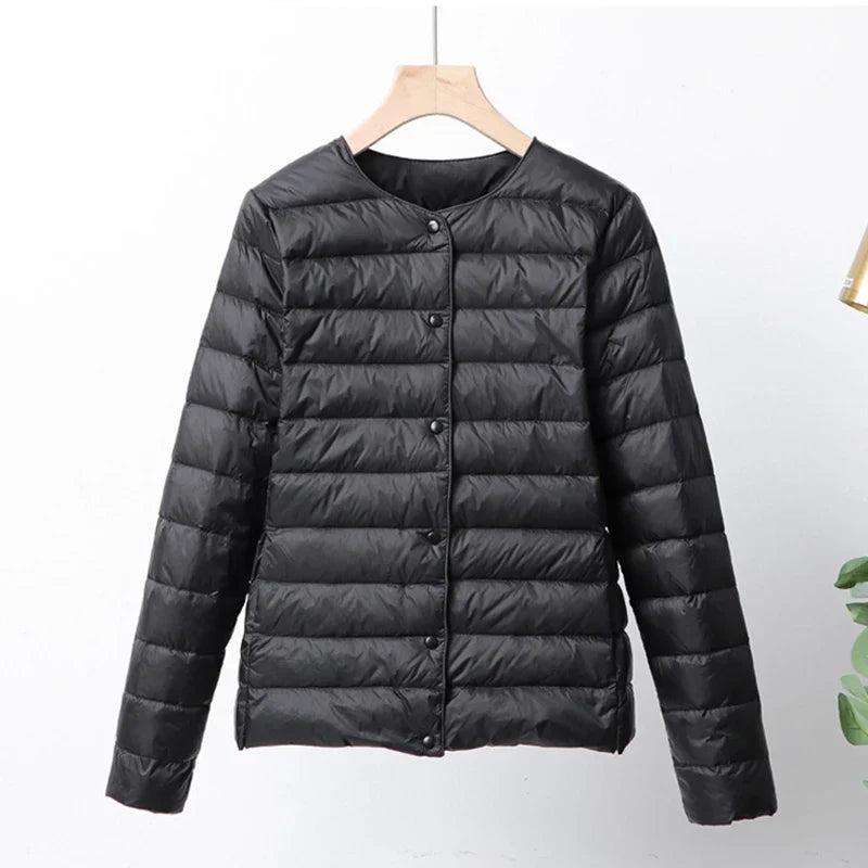 Krohn-e | Faltbare Pufferjacke mit Druckknopfverschluss