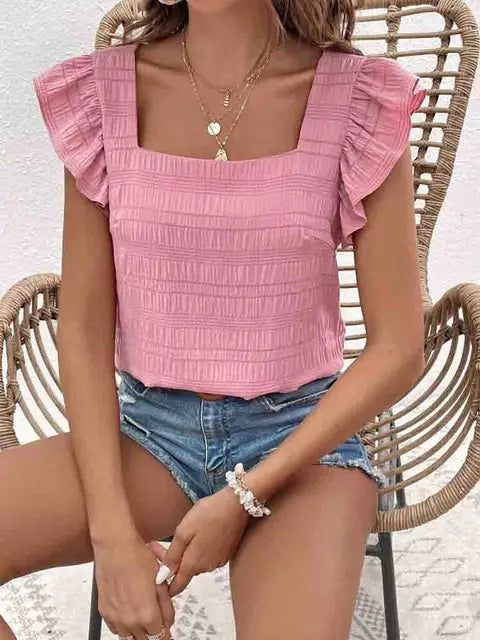 Schwarzes Oberteil mit Rüschen von Rosia