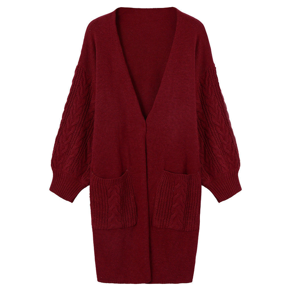 Damen Strickmantel mit tiefem V-Ausschnitt und groben Zopfstrickdetails Krohn-e