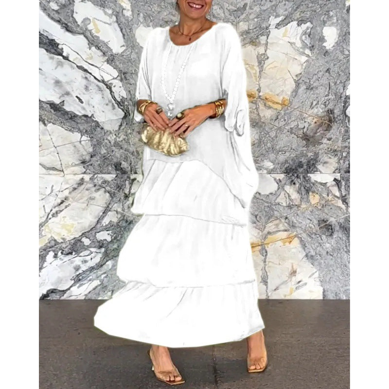 Elegantes langes Damenkleid mit Rundhalsausschnitt und Fledermausärmeln von Krohn-e