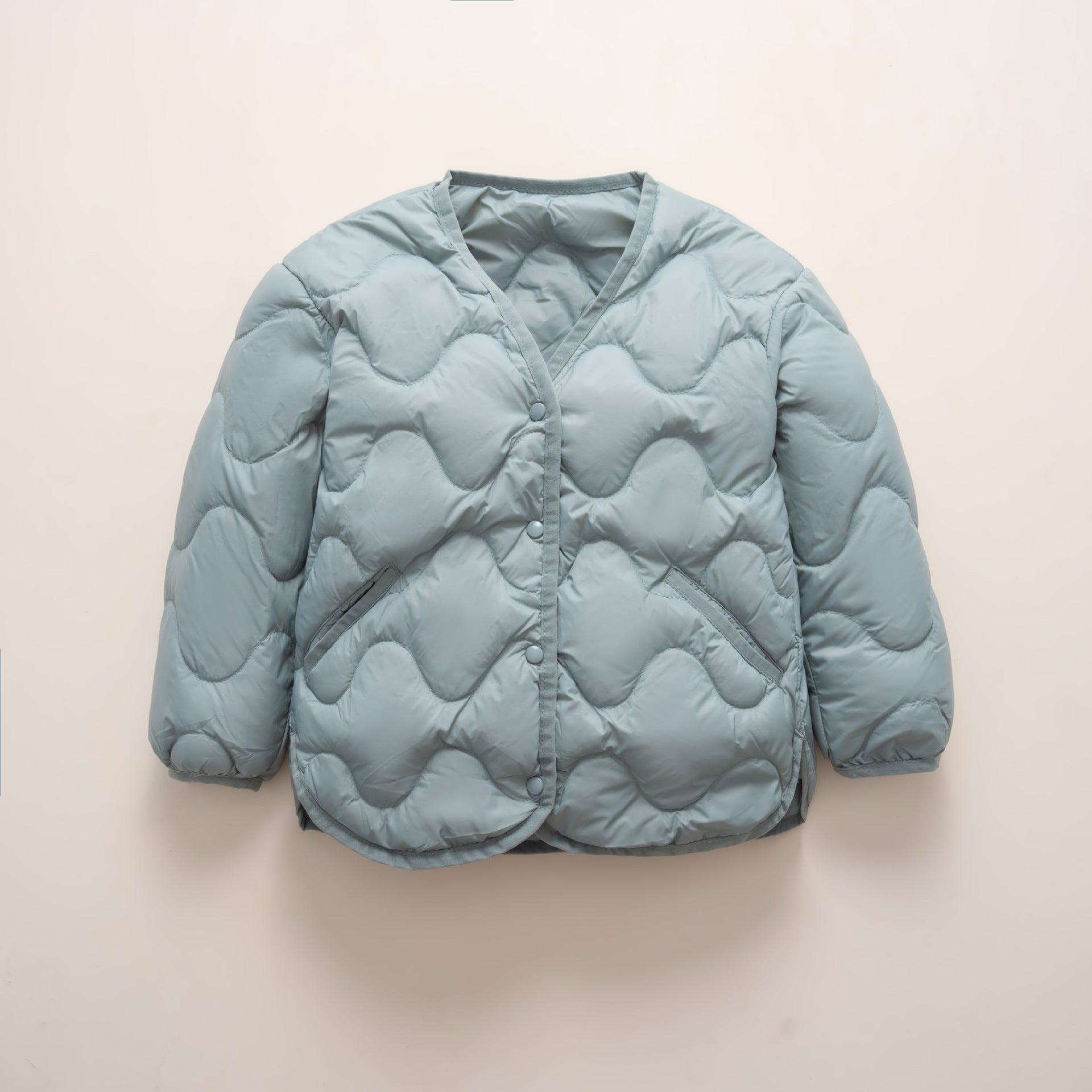 Damen gesteppte Daunenjacke mit modernen Wellenmustern und praktischen Taschen Krohn-e