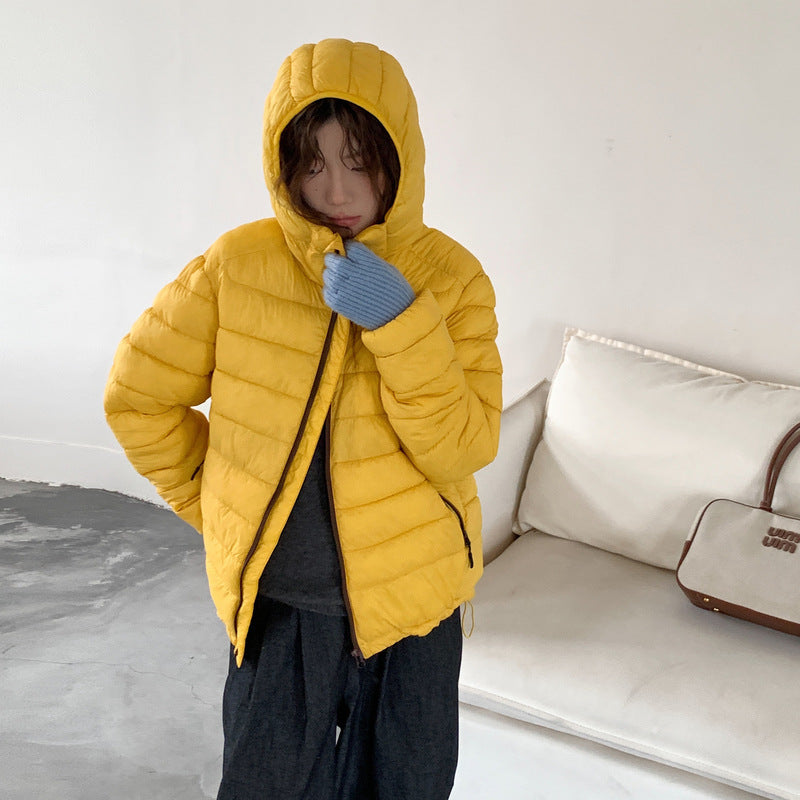 Damen ultraleichte Pufferjacke mit abnehmbarer Kapuze und elastischem Saum Krohn-e