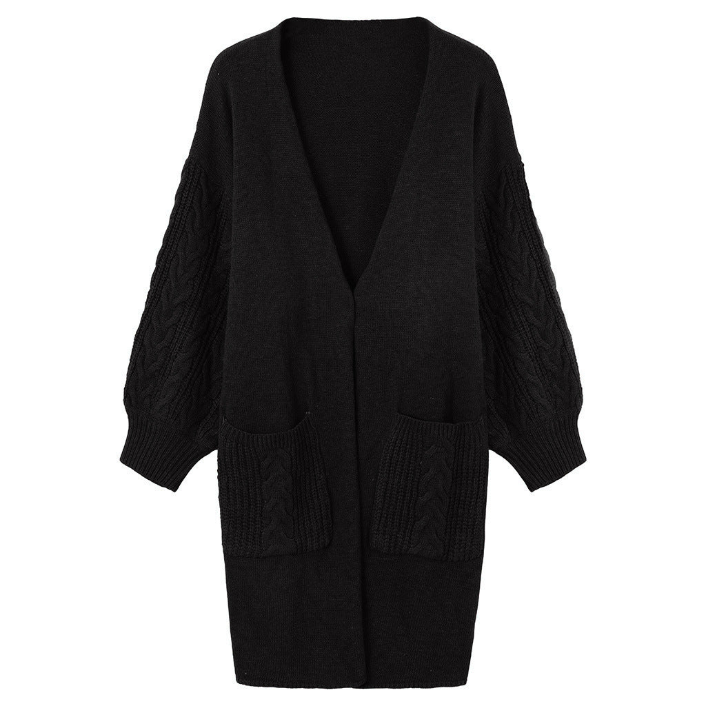 Damen Strickmantel mit tiefem V-Ausschnitt und groben Zopfstrickdetails Krohn-e