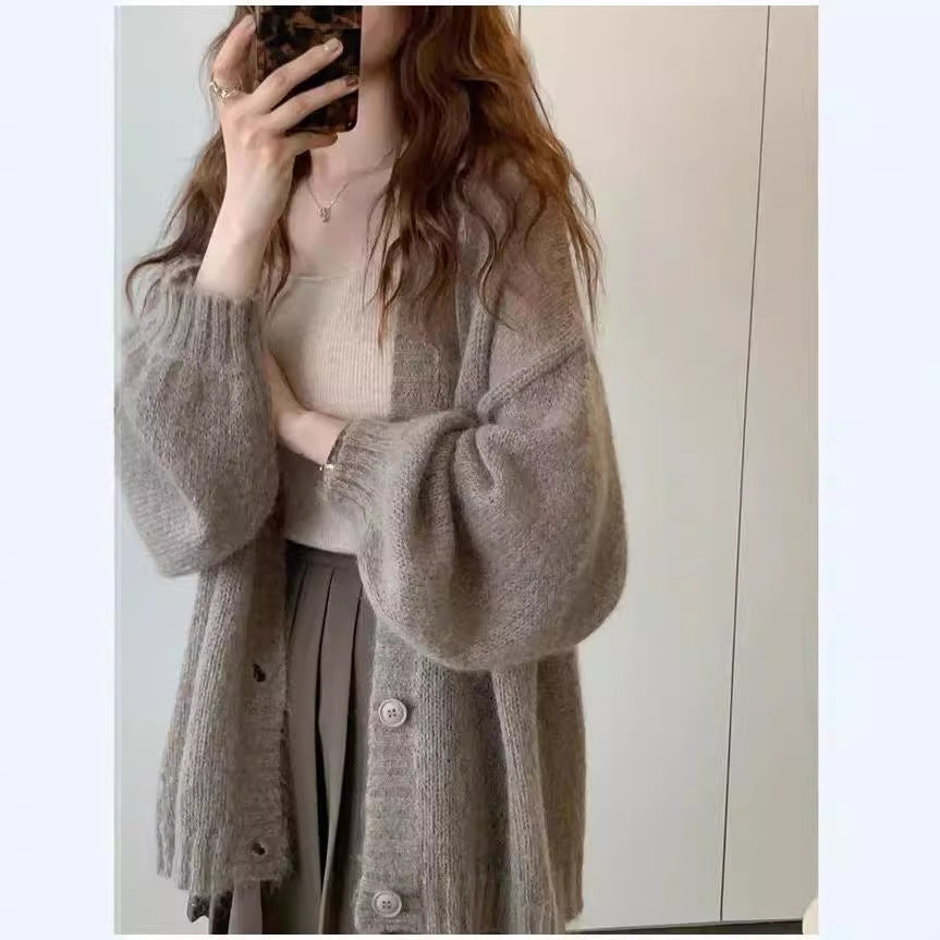 Damen Strickjacke im lässigen Oversized-Stil mit voluminösen Ärmeln und praktischen Taschen Krohn-e