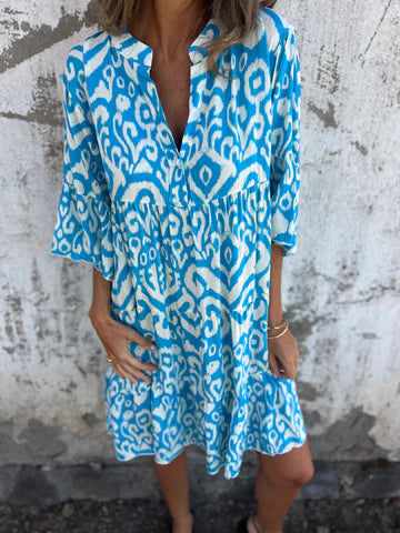 Elegantes Fudus Kleid mit Frühlings-Sommer-Print, Volants und V-Ausschnitt