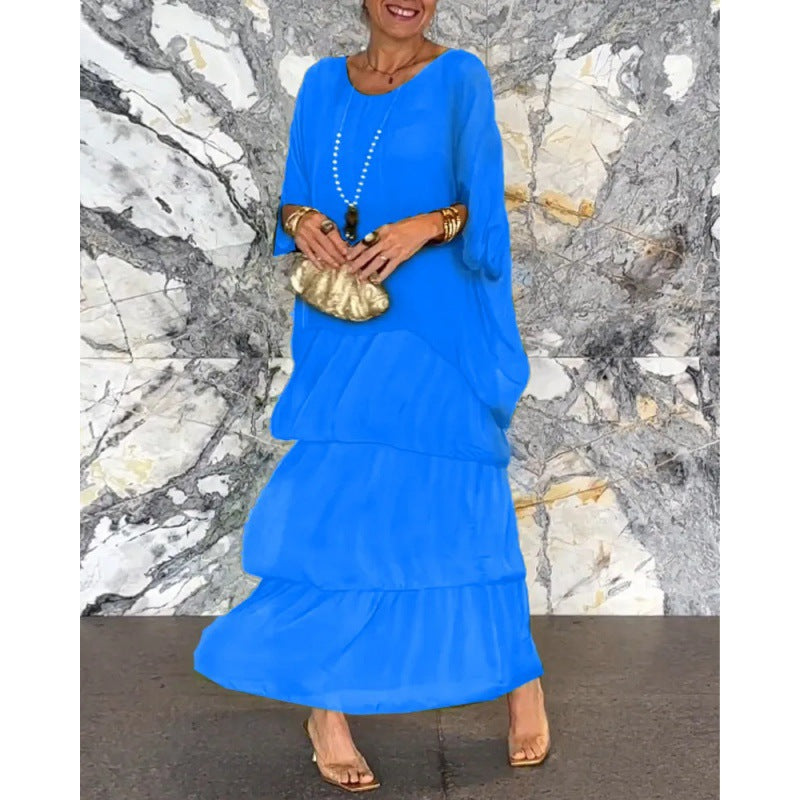 Elegantes langes Damenkleid mit Rundhalsausschnitt und Fledermausärmeln von Krohn-e