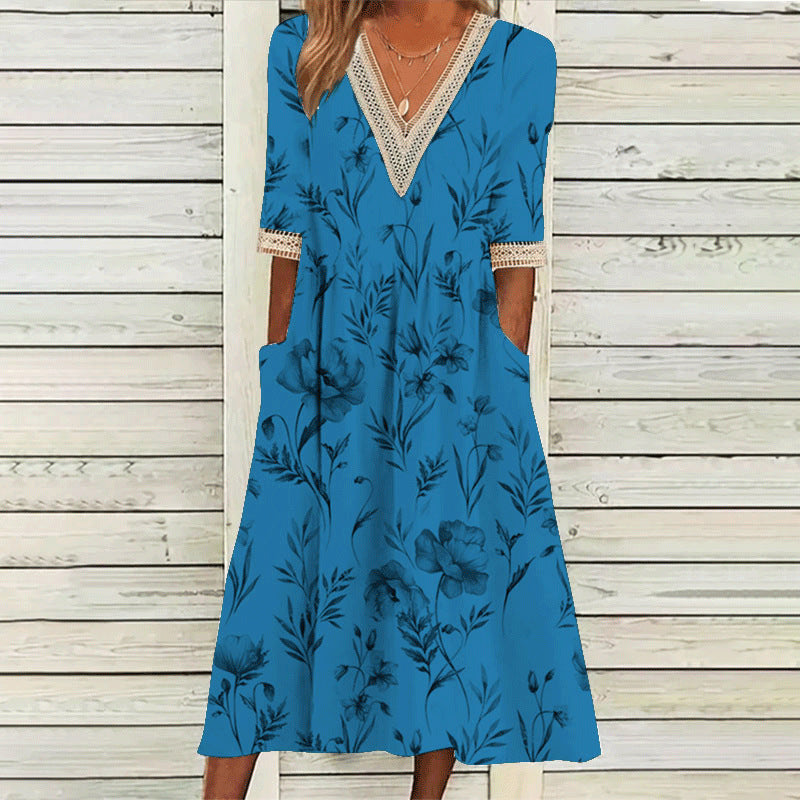 Elegantes Spitzenkleid mit V-Ausschnitt und Dreiviertelärmeln von Fudus