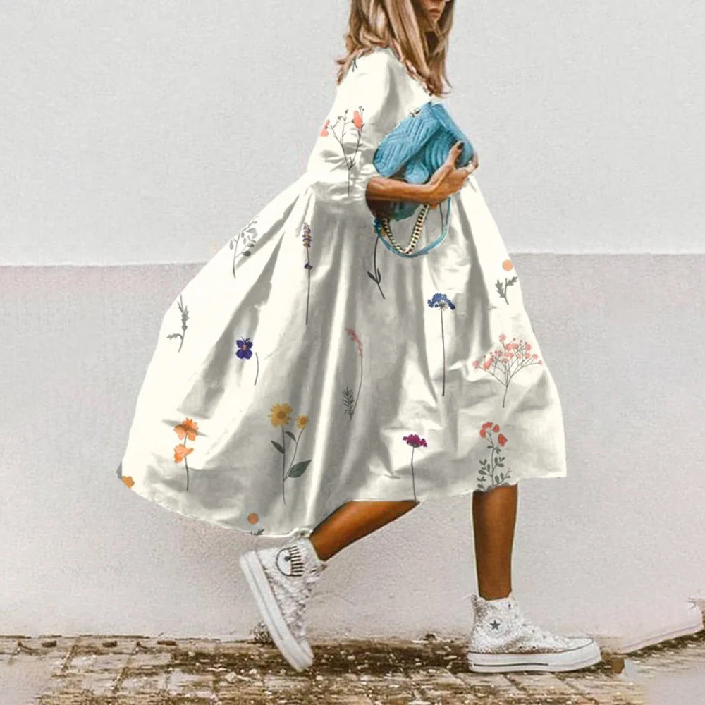 Fudus Kleid mit elegantem Blumenmuster und Dreiviertelärmeln