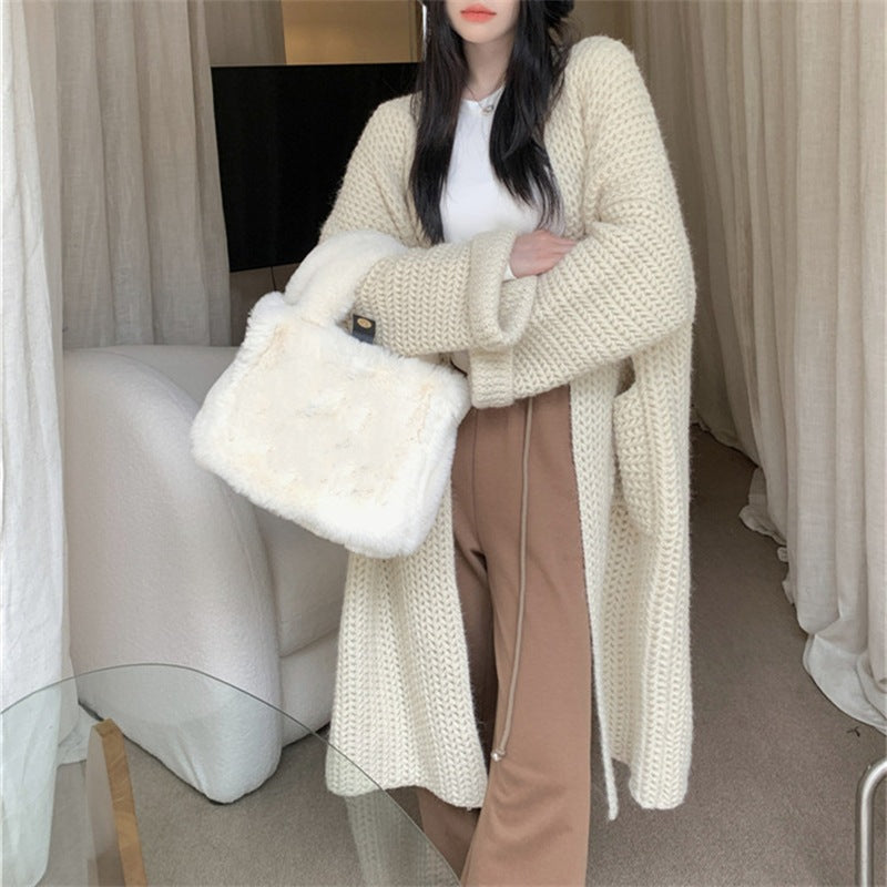 Damen Lange Strickjacke mit praktischen Taschen und modischem Zopfmuster Krohn-e