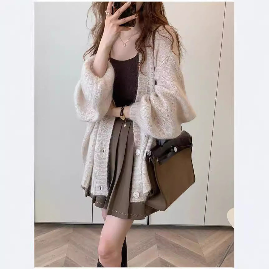 Damen Strickjacke im lässigen Oversized-Stil mit voluminösen Ärmeln und praktischen Taschen Krohn-e