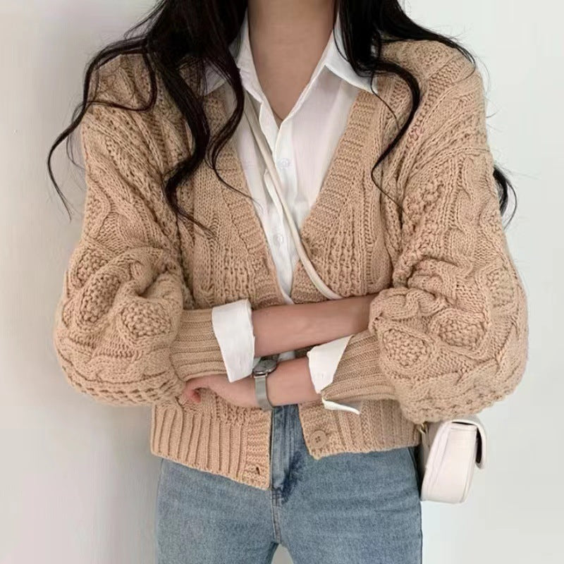 Damen Grobstrickjacke mit voluminösen Ärmeln und einzigartigem Zopfmuster Krohn-e