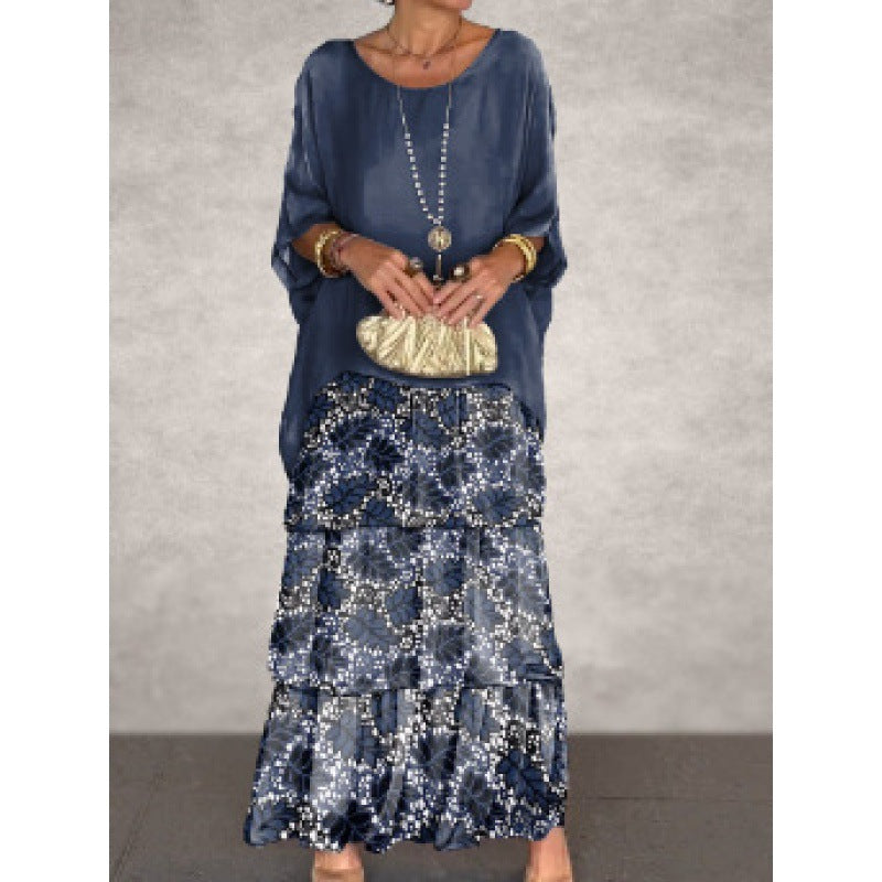 Elegantes langes Damenkleid mit Rundhalsausschnitt und Fledermausärmeln von Krohn-e