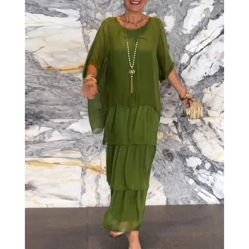 Elegantes langes Damenkleid mit Rundhalsausschnitt und Fledermausärmeln von Krohn-e