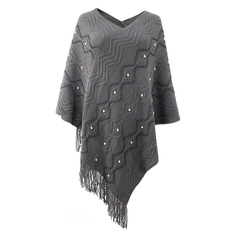 Damen eleganter Poncho mit auffälligem Strukturmuster und dekorativen Fransen Krohn-e