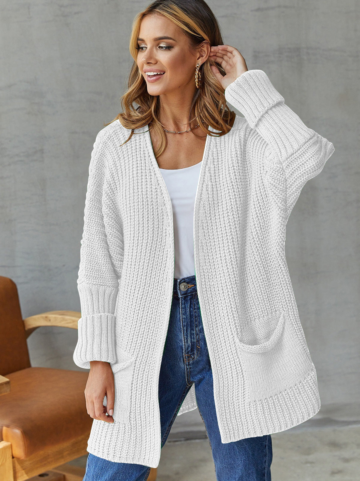 Damen gemütliche Strickjacke mit tiefen Taschen und volumetrischen Ärmeln Krohn-e