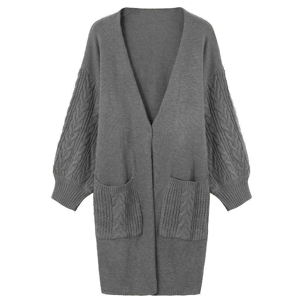 Damen Strickmantel mit tiefem V-Ausschnitt und groben Zopfstrickdetails Krohn-e