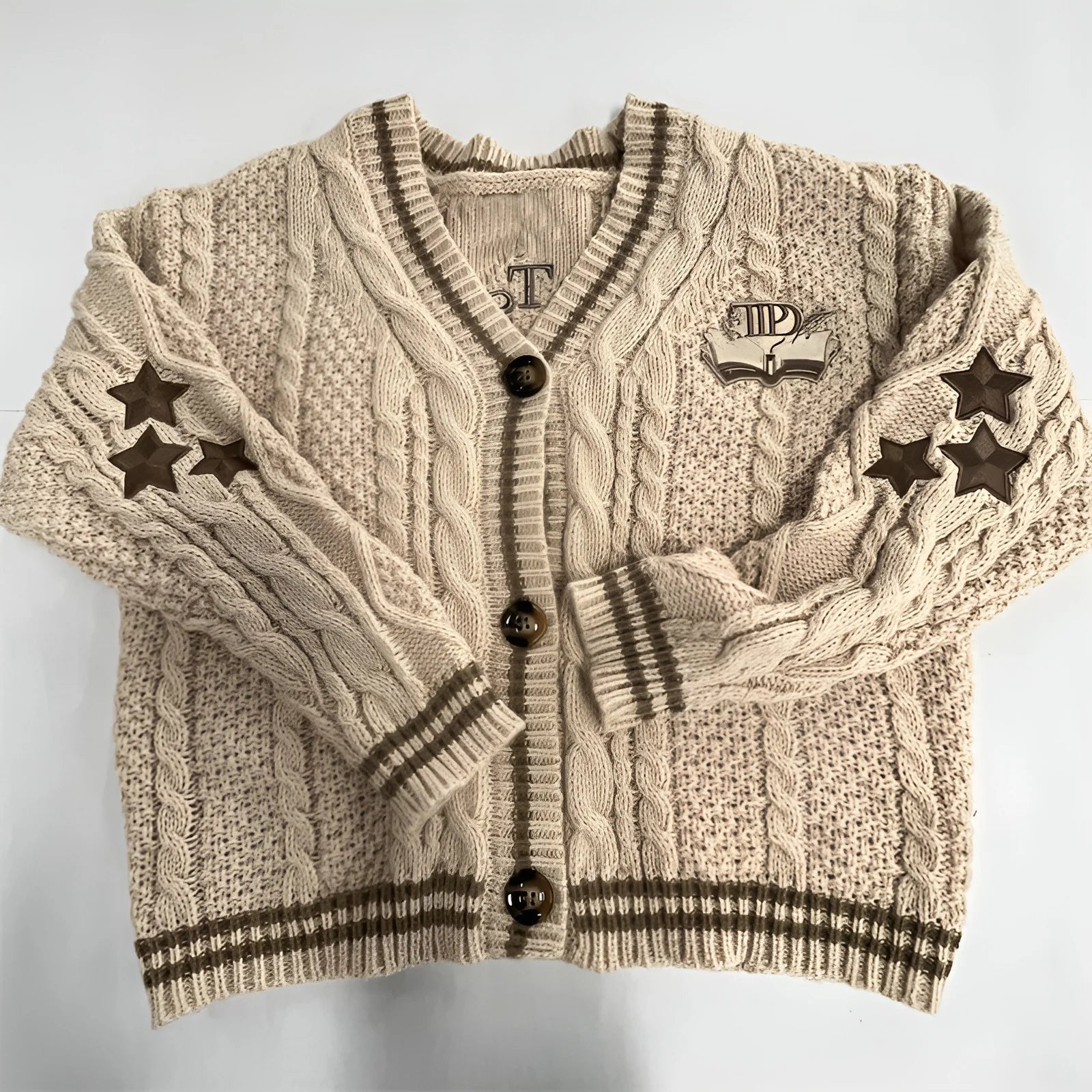 Krohn-e | Strickjacke mit Knopfleiste und Sternenmuster