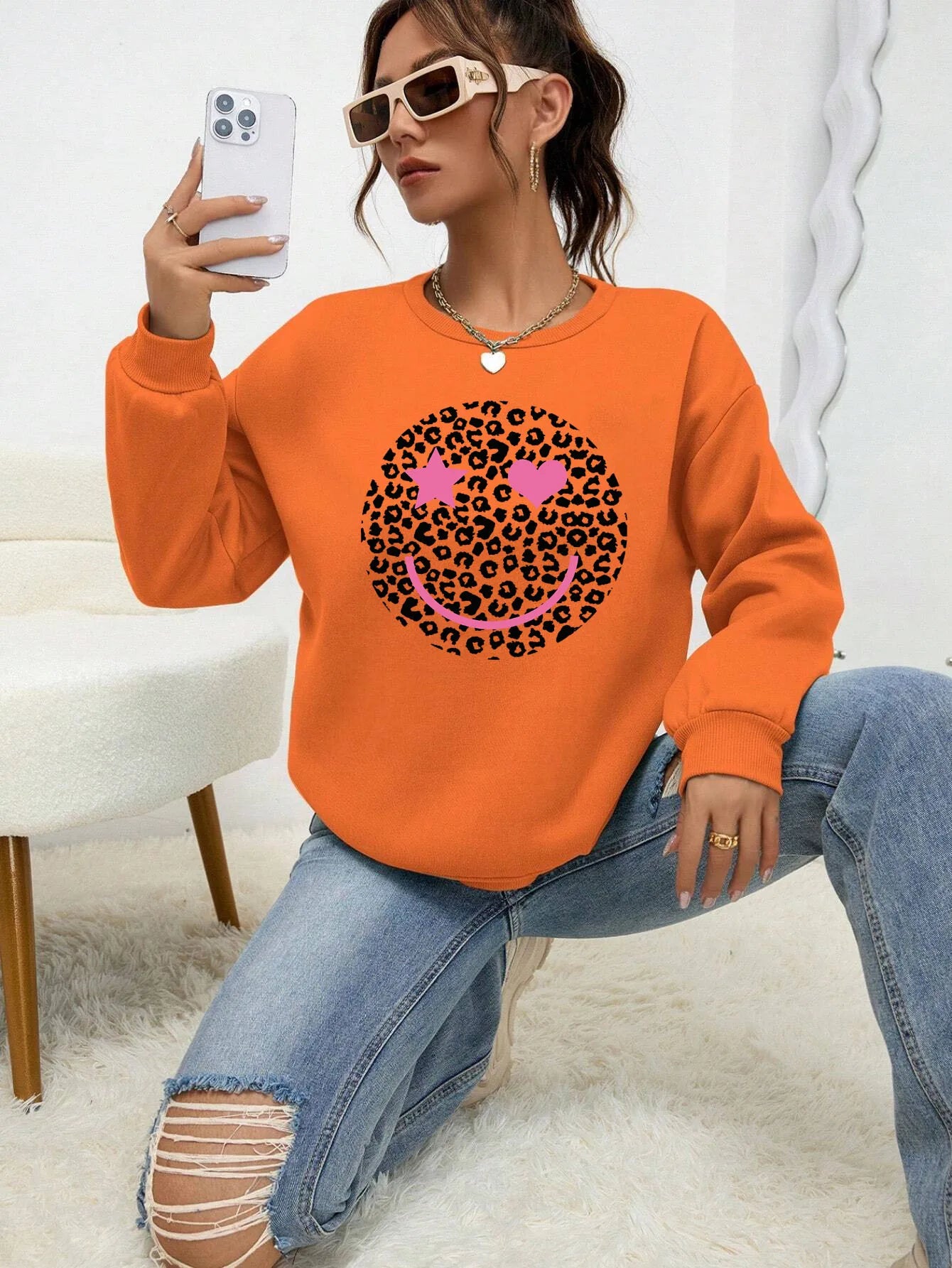 Krohn-e | Lässiges Sweatshirt mit Leopardenmotiv Baumwollmischung Trendy und Komfortabel