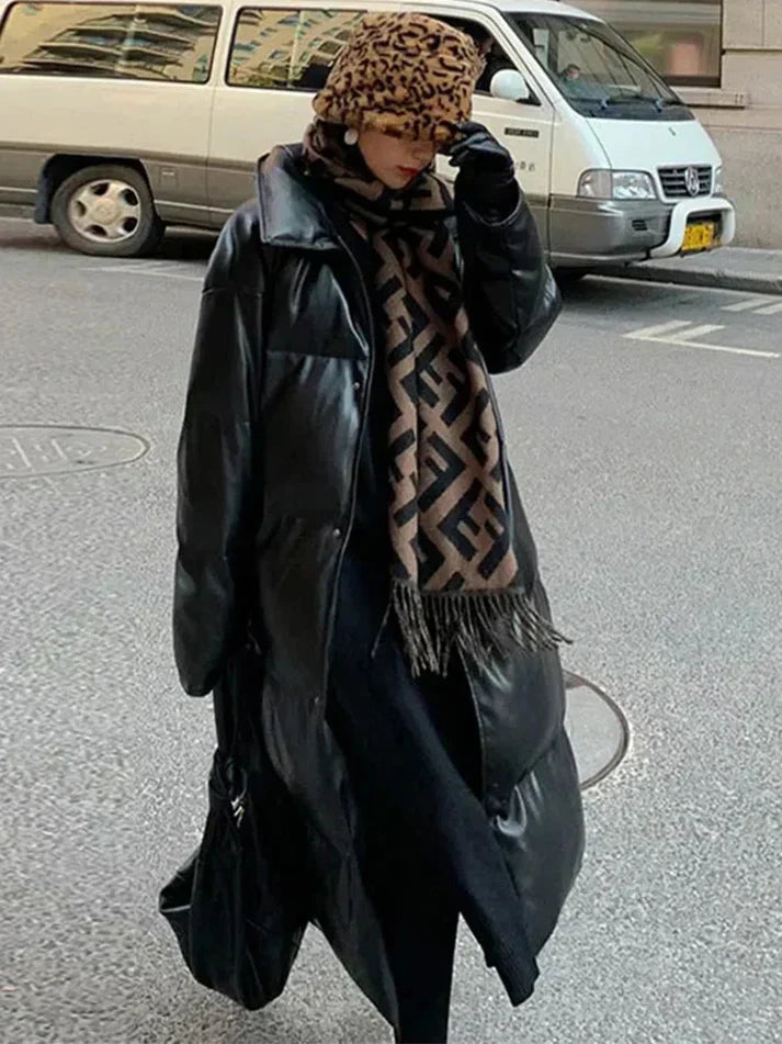 Krohn-e | Lange Leder-Pufferjacke mit Gürtel