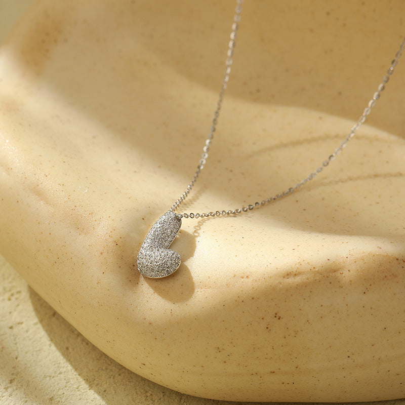 Fudus Stahl-Anhänger mit dicken Buchstaben