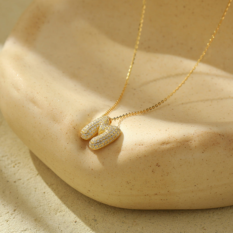 Fudus Stahl-Anhänger mit dicken Buchstaben