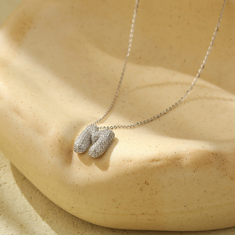 Fudus Stahl-Anhänger mit dicken Buchstaben