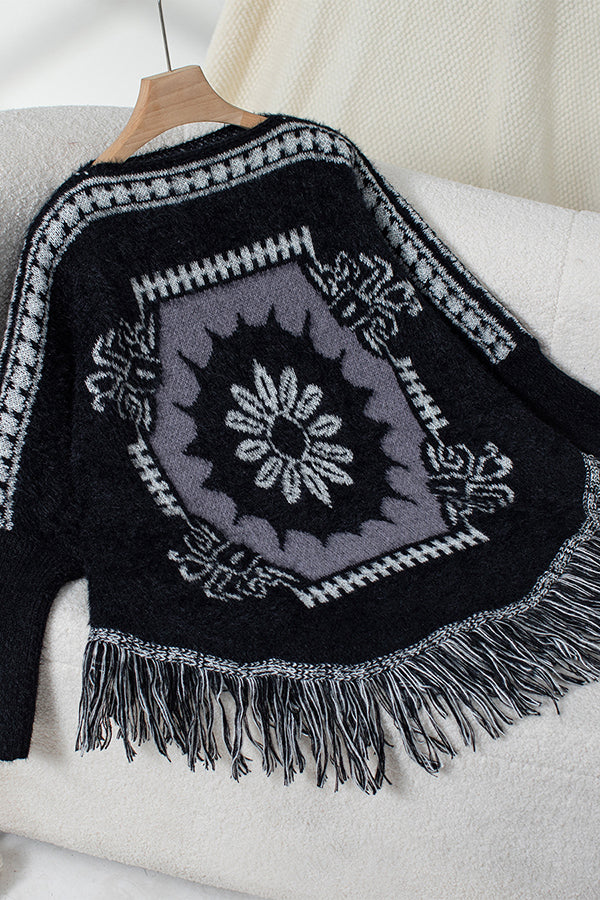 Krohn-e | Strickpullover mit Quastenabschluss