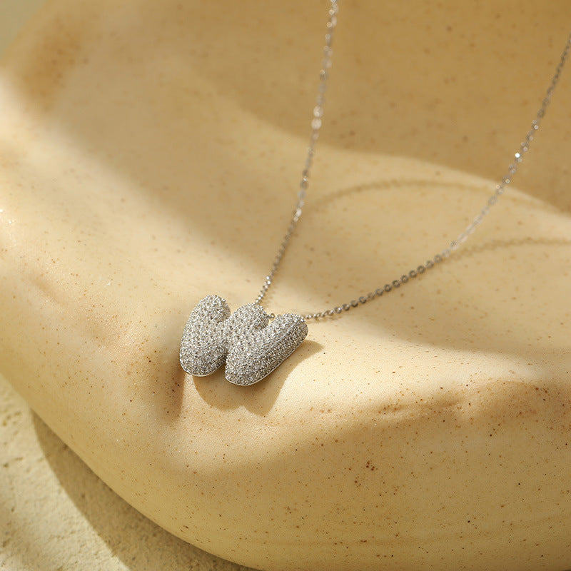 Fudus Stahl-Anhänger mit dicken Buchstaben