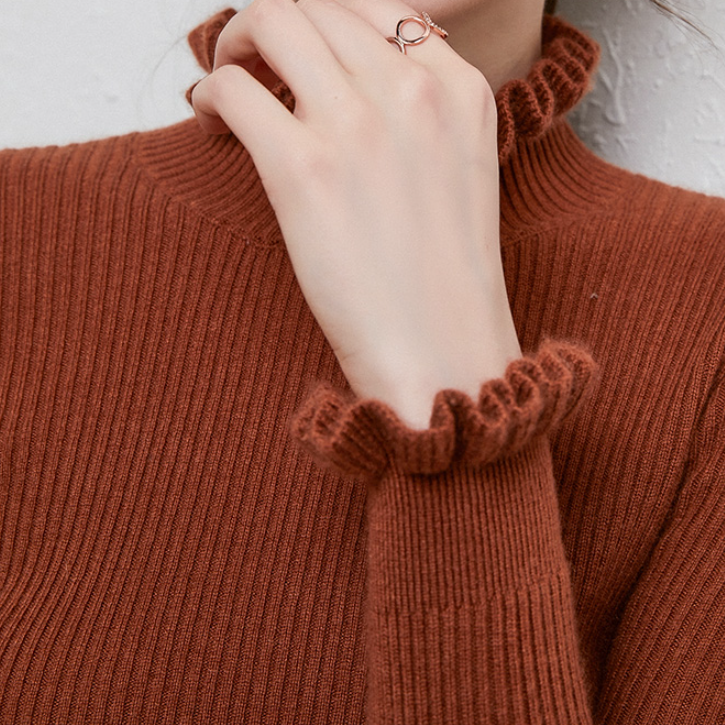 Krohn-e | Rollkragenpullover mit femininen Rüschendetails