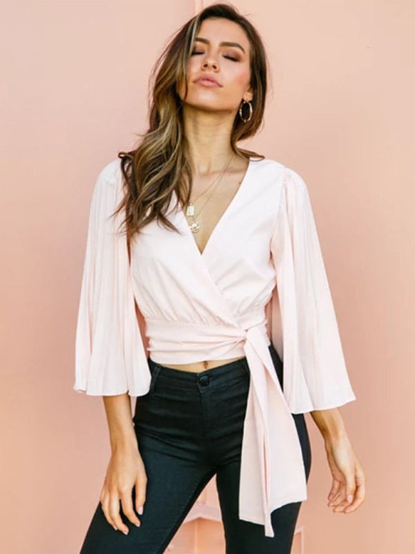 Fudus Top mit V-Ausschnitt und Trompetenärmeln